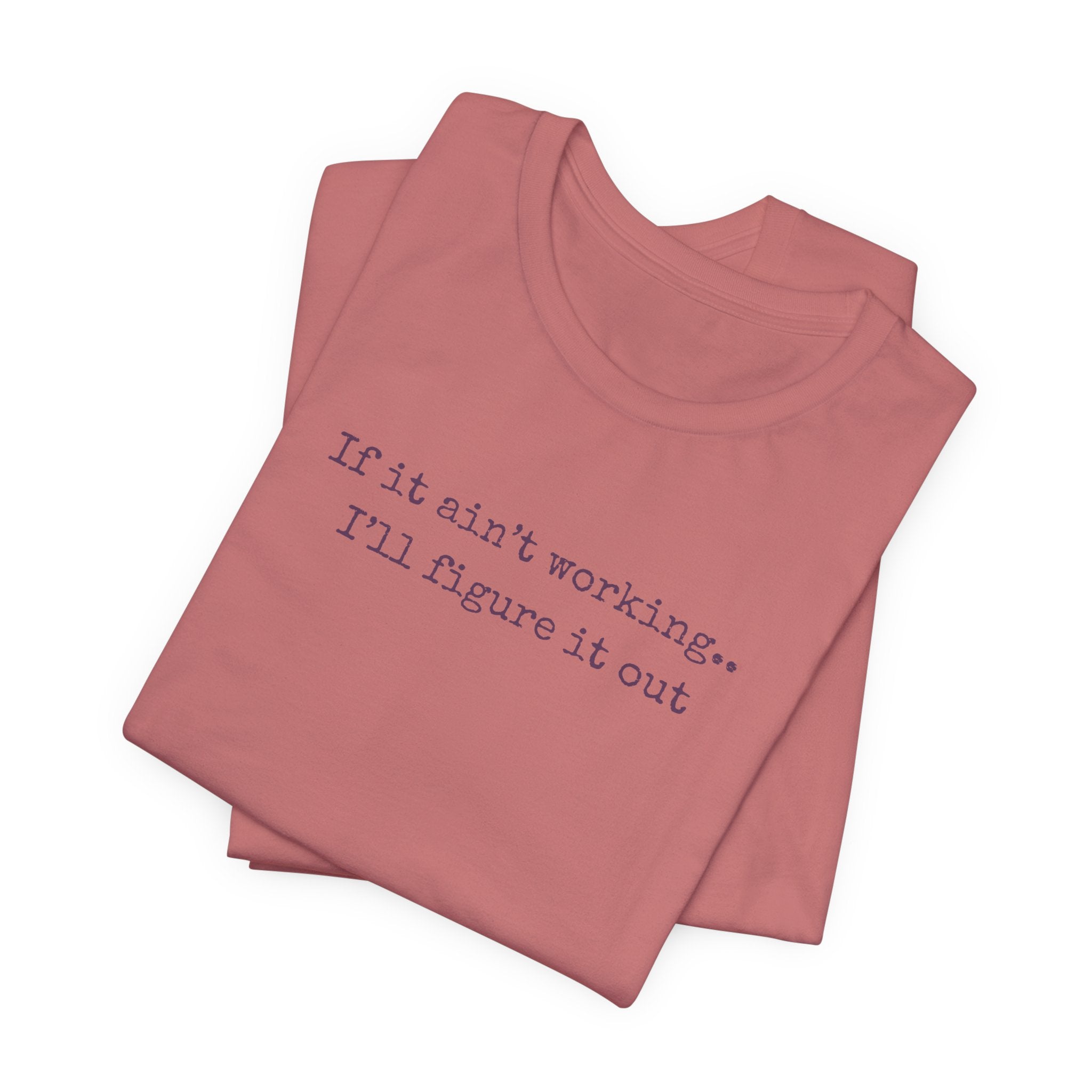 "If it ain't working... I'll figure it out" Minimalist Motivational T‑Shirt
