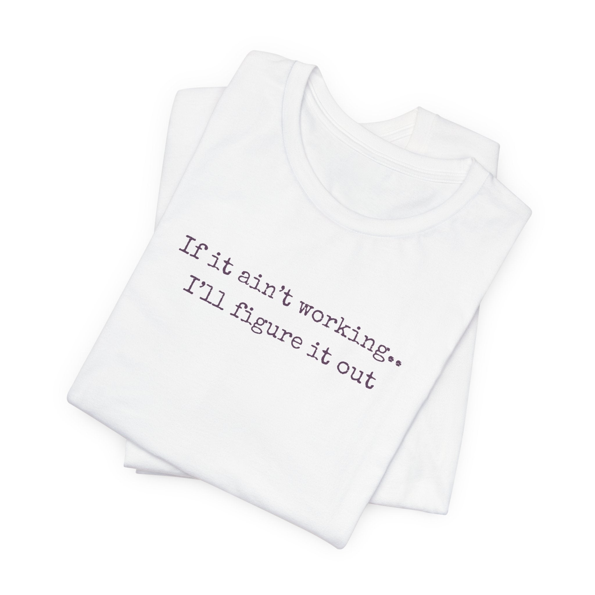 "If it ain't working... I'll figure it out" Minimalist Motivational T‑Shirt